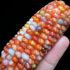 七彩宝石文玩玉米带皮天然宝石血丝文玩玉米毛料，不带皮
